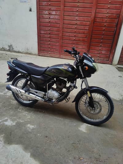 Honda Deluxe 125 ( nut to nut genuine)