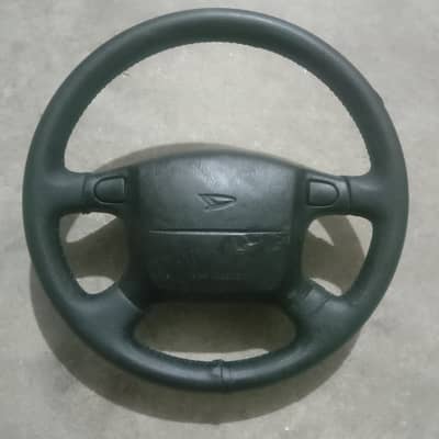 Daihatsu Sirion, Mira, and Move.  steering airbag