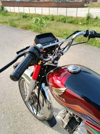 Honda 70.  use very emblish.