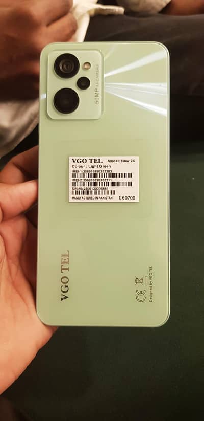 vgo tel new 24 condition 10/9 original charger and box sath hay