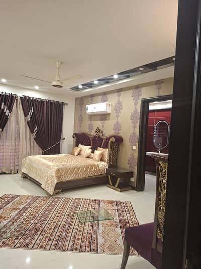 FULLY FURNISHED MODERN DESIGN 2-KANAL BUNGALOW WITH 45 KVA SOLAR AND 25 KV GENERATOR IS AVAILABLE IN THE BEST BLOCK OF DHA LAHORE.