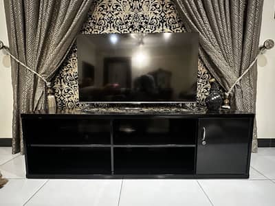 Almost new TCL LED with cabinet