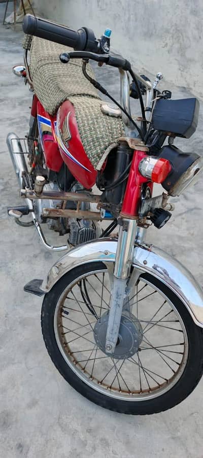 Honda cd 70 0.3. 70.95. 13.4. 46 Whatsapp