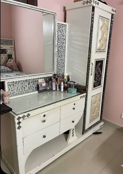 Dressing table with attached cupboard