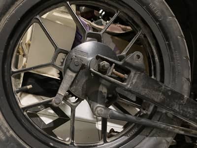 derbi stx rear 17inch rim complete with hub axle and sprocket