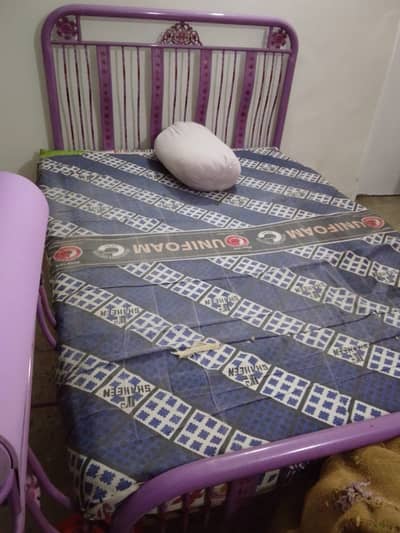 Iron queen bed and dressing.