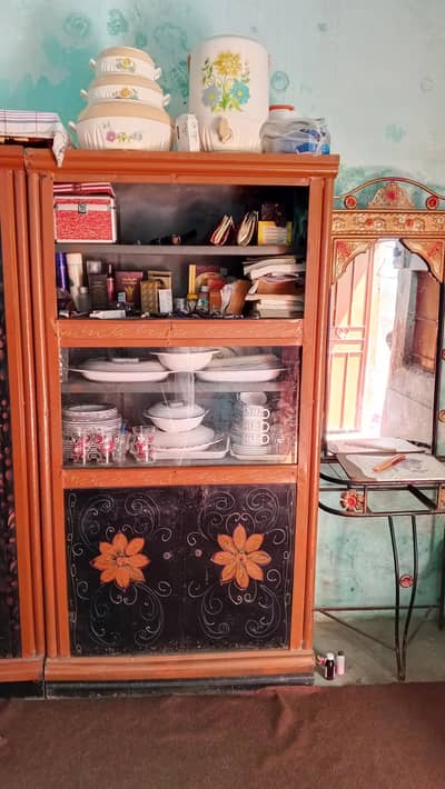 Almirah + showcase + singer table + double bed