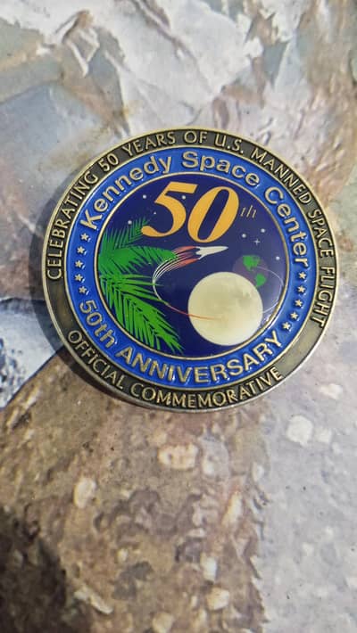 nasa space flown metal medallion