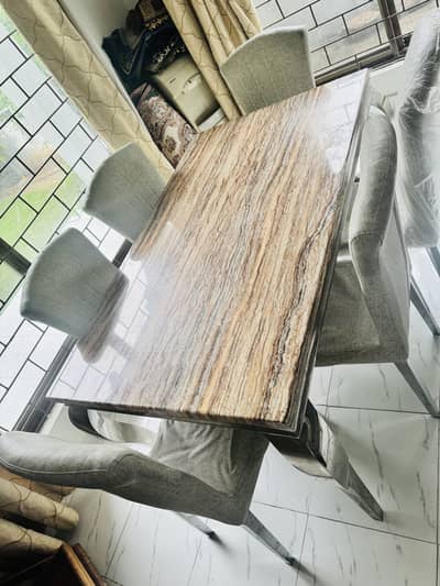 Heavy marble top with six seats