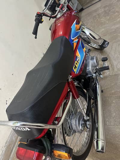 Honda CD70 2026 red color 2800 kilometres drive urgent sale