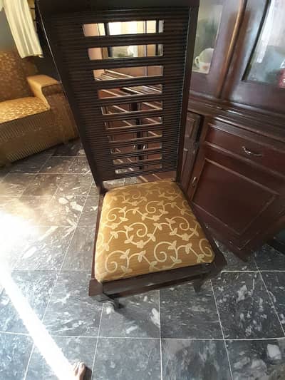 Used Dinning table with six Chairs in Good Condition