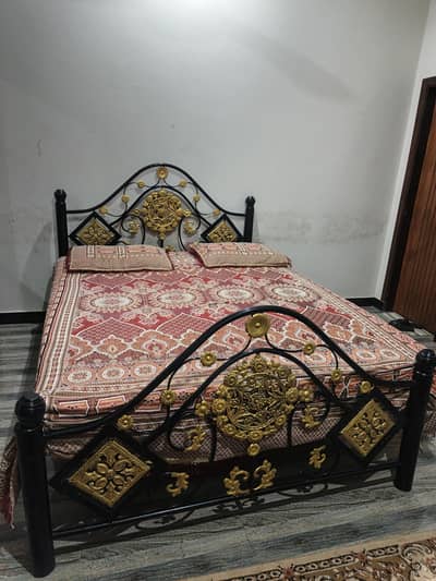 iron bed with storage rack