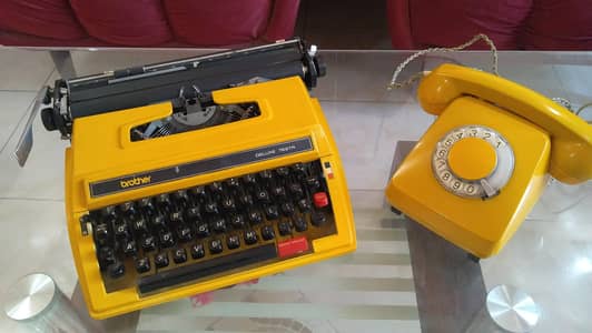 vintage typewriters and dialer telephone