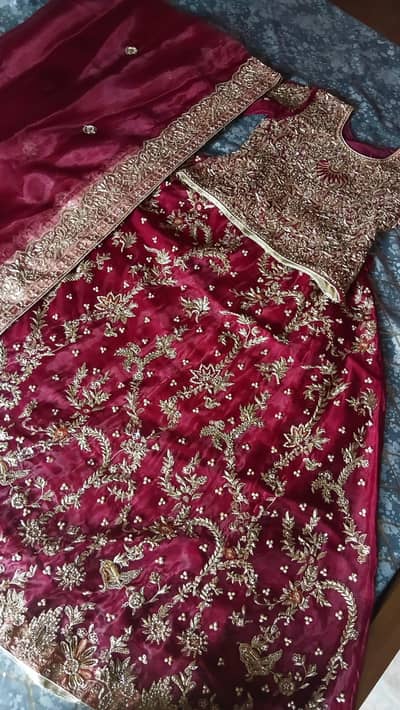 Bridal lehenga in Mahroom clr
