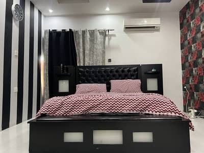 Bed with side tables