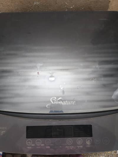 Signature brand washing machine