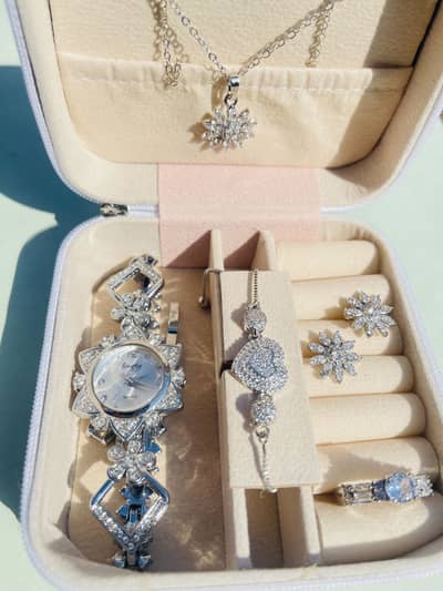Silver watch with silver jewellery set in box