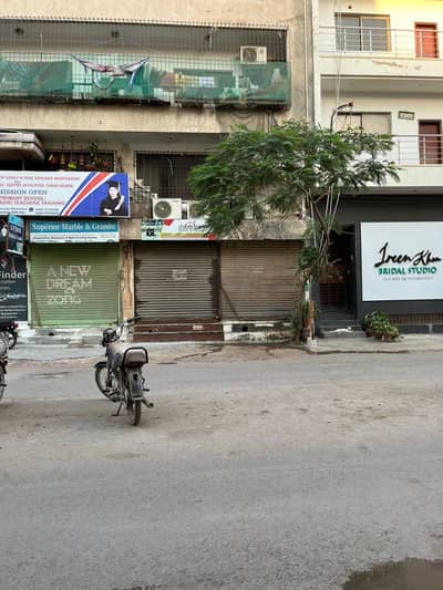 SHOP FOR RENT ON 12TH COMMERCIAL DHA PHASE 2 EXT.