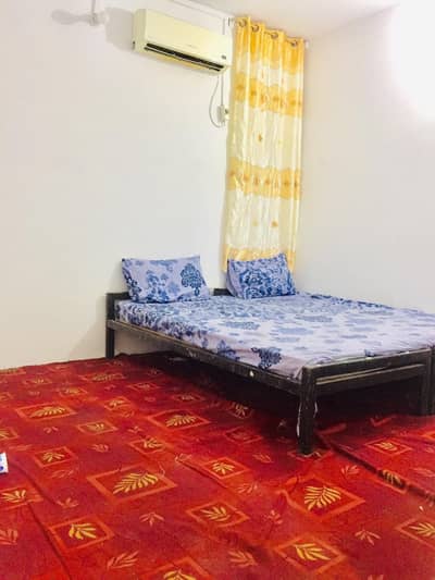 Semi Furnished Independent Flat/ Apartment with 2 Rooms for Rent in Q Block Model Town Lahore with AC, Mini Room Fridge, Curtain, Bed, Kitchen & bath room Rent = 30000
