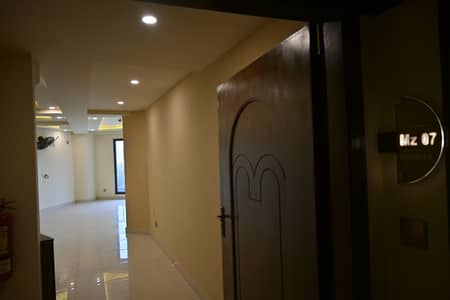 Family-Friendly 2-Bedroom Luxury Apartment with Powder Room for Rent in Bahria Town