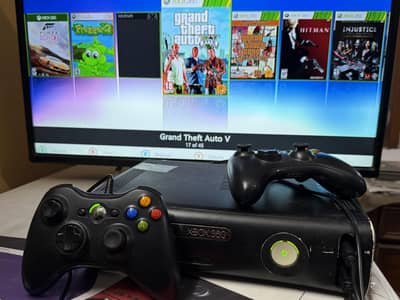 urgent xbox 360  with 2 controllers for sale