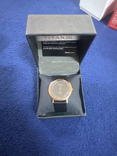Titan edge MENS watch