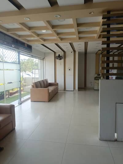 1 kanal ground floor life time commercial hall furnished For rent Prime Location on main boulevard khaybe ne janah Road lahore Near ucp university or Abdul Sattar Eidi Motorway M2 or shaukat khanum Hospital