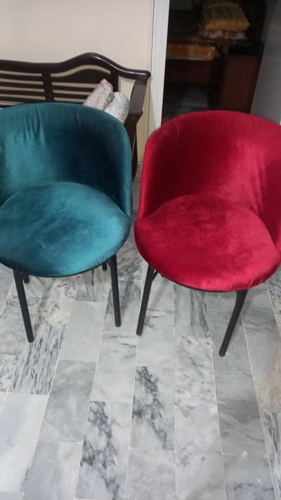Seagreen and red dining chairs