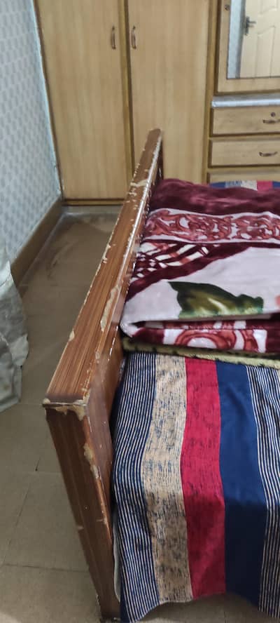 king size bed with dressing and side table