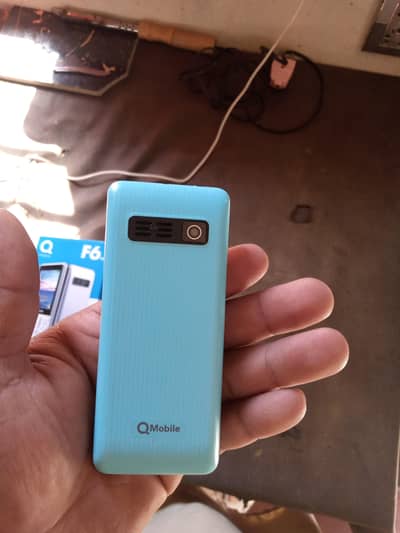 Q mobile 4 SIM. . . emergency sale 2 din hue new liya