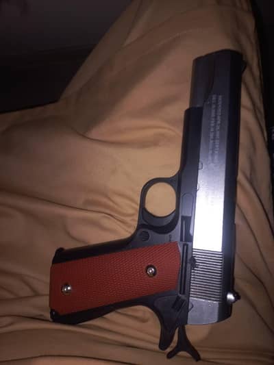 colt 1911 toy gun hard material and heavy weight.