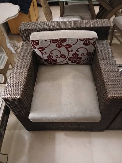 2 One seater Cane Sofas with glasstop Side table