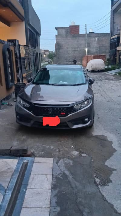 Honda civic X available for pick and drop service in lahore
