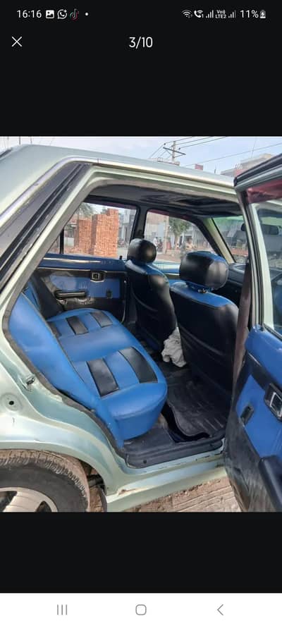 mazda 323 koi be bhi Mehran ka sath exchang be kar sakta