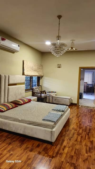Luxury Ground Portion Renovated Fully Furnished Foreigners and Pakistani With Lawn ,Rent Included All Utilities