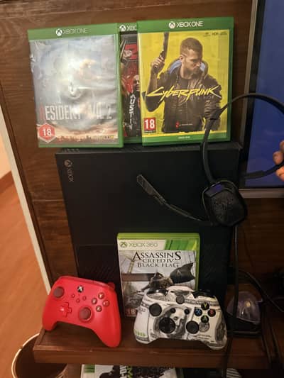 Xbox one 2 controllers and more than 20 AAA games 1 TB storage