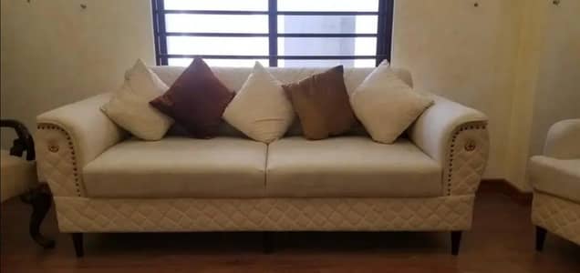 Nine seaters sofa with center Table