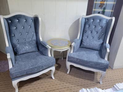 classic wing chairs with ottoman