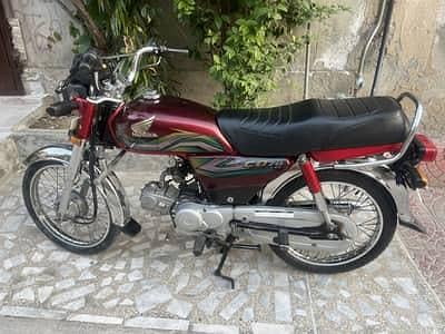 Honda cd 70 red