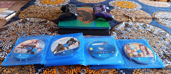 PS4 slim 500 GB used with games and controllers