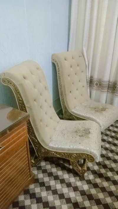 2 chairs with wooden frame