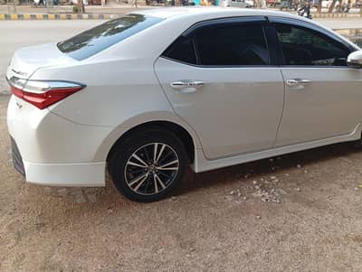 Toyota Grande 22 model white with black room