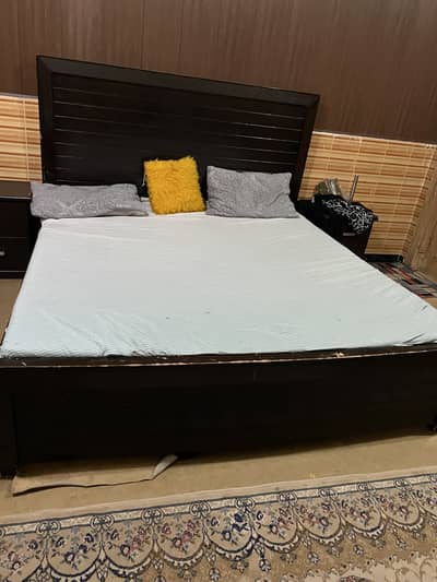 Wooden bed in 10/9 condition along with diamond supreme mattress