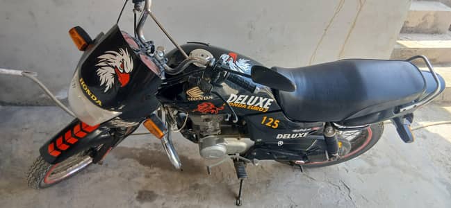honda deluex 125cc 5 gar