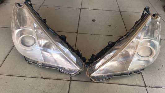 Prius alpha head light