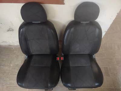 Dolphin front seats with black leather covers