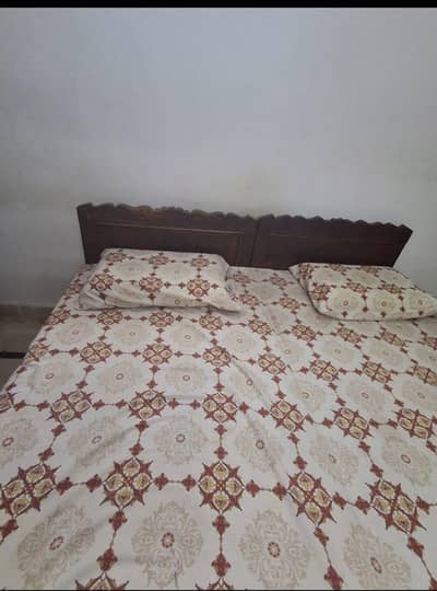 2 single wooden bed without mattress