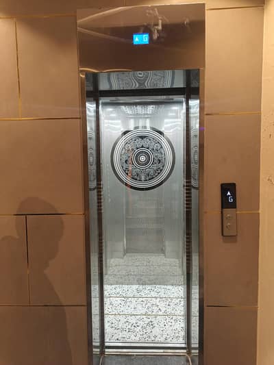elevator lift hom & office plaza