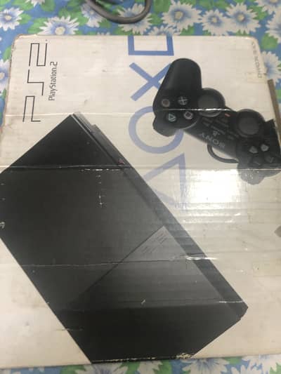 Play station 2 with box,two controllers,av cable,power cable