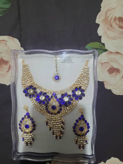Indian made jewelry set with blue stones negotiable.